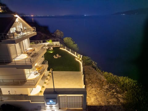Property building, Patio, Night, Natural landscape, View (from property/room), Balcony/Terrace, Sea view
