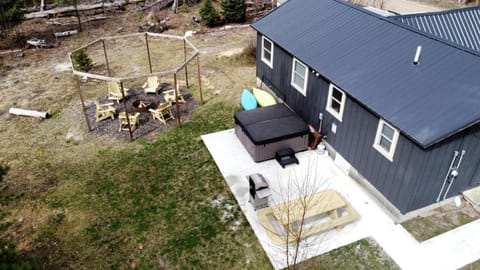 Secluded Rustic Cabin with Hot Tub Near Pere Marquette River in Big Rapids, Michigan Cabin in Michigan