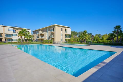 Property building, Day, Pool view, Swimming pool