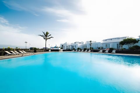 Property building, Living room, Swimming pool