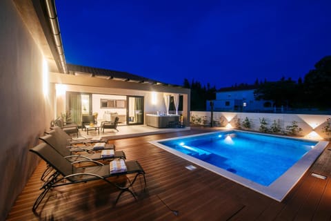 Patio, Night, Natural landscape, Pool view, Swimming pool, sunbed