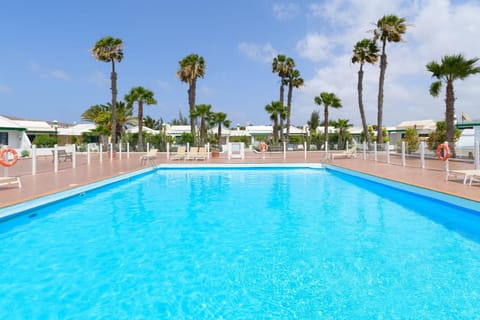 Property building, Living room, Swimming pool