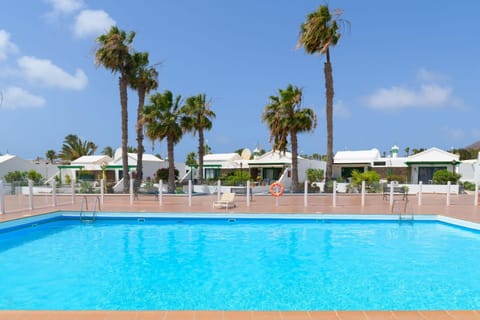 Property building, Living room, Swimming pool