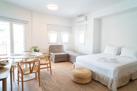 Bed, Photo of the whole room, Seating area, Dining area, Bedroom, towels, air conditioner
