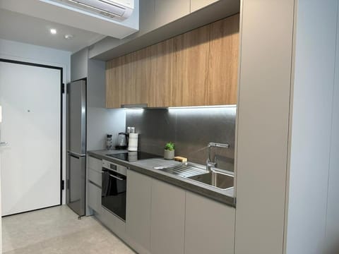 Kitchen or kitchenette, oven