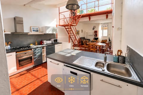 Kitchen or kitchenette, dishwasher, oven, stove
