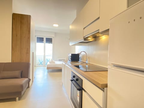 Kitchen or kitchenette, Living room, oven, stove