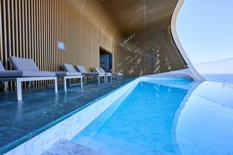 Swimming pool, sunbed