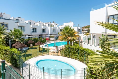 Property building, Living room, Swimming pool