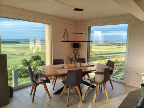 Natural landscape, Living room, Seating area, Dining area