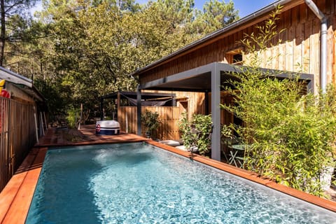 Property building, Living room, Swimming pool