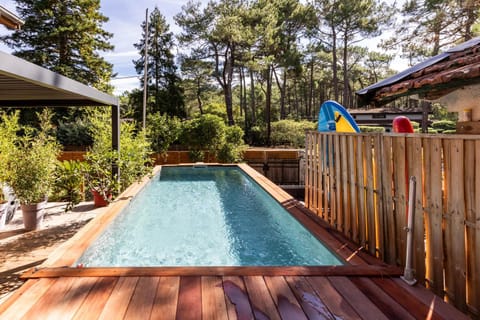 Property building, Living room, Swimming pool