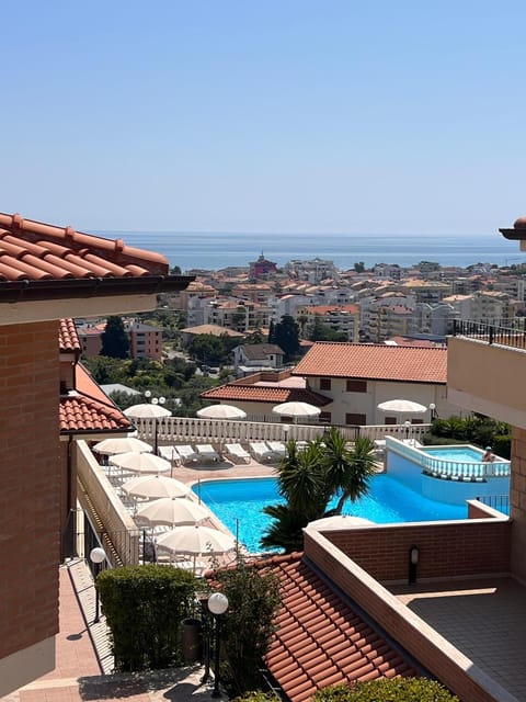 Property building, Natural landscape, City view, Pool view, Sea view, Swimming pool, sunbed