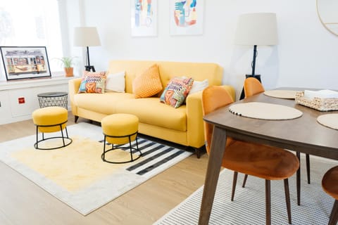 Bed, Living room, Seating area, Dining area