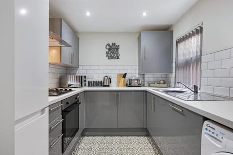 Kitchen or kitchenette, oven, stove, toaster