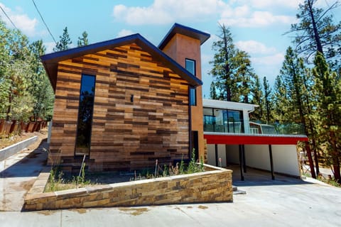 Hillside Hideaway ~ Dog-friendly home with wraparound deck, grill, game room, & bar - walk to dining House in Big Bear