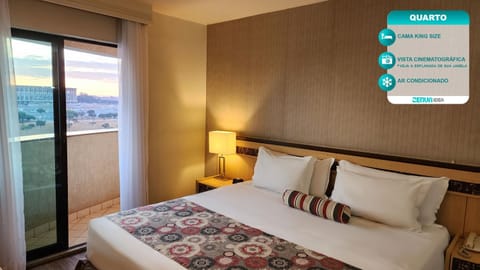 Bed, Balcony/Terrace, Photo of the whole room, Bedroom, Text overlay, City view, air conditioner