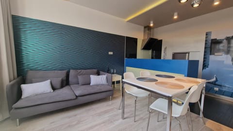 Kitchen or kitchenette, Living room, Seating area, Dining area