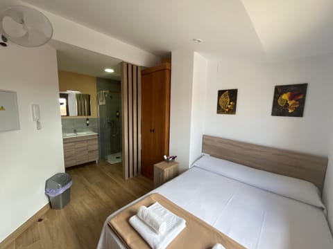 Bed, Photo of the whole room, Bedroom, towels, wardrobe