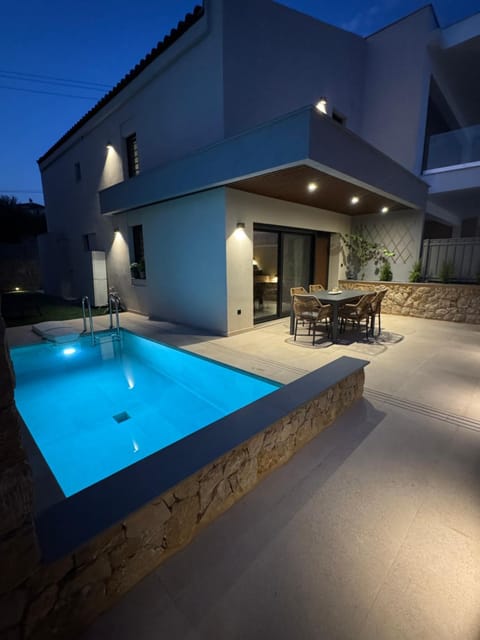 Property building, Night, Pool view, Swimming pool