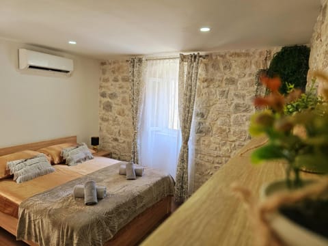 Bed, Photo of the whole room, Bedroom, towels, air conditioner