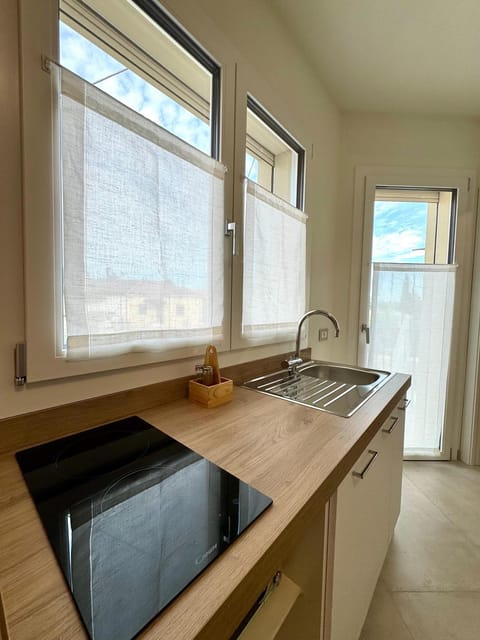 Kitchen or kitchenette, stove