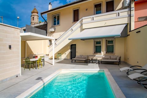 Property building, Patio, View (from property/room), Pool view, Swimming pool, sunbed