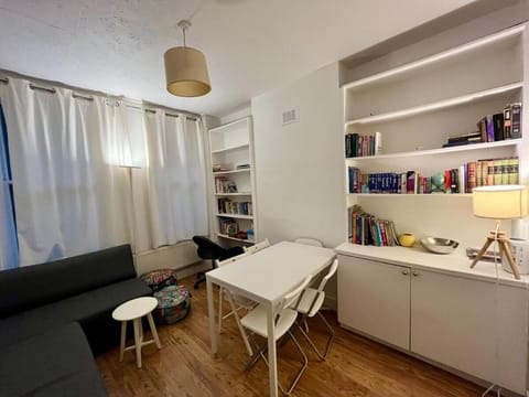 Library, Living room, Seating area, Dining area