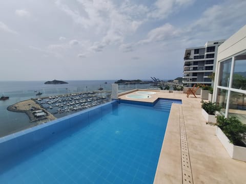 Property building, Day, Natural landscape, Pool view, Sea view, Swimming pool, Swimming pool, sunbed