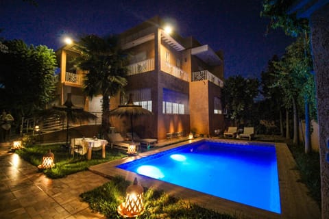 Property building, Night, Pool view, Swimming pool