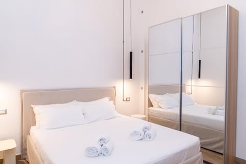 Bed, Photo of the whole room, Bedroom, towels, wardrobe