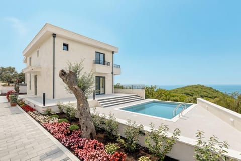 Property building, Day, Natural landscape, Pool view, Sea view, Swimming pool