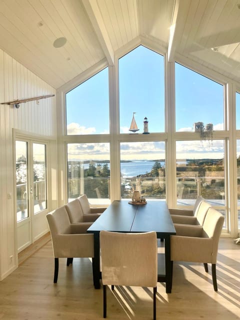 Natural landscape, View (from property/room), Living room, Seating area, Dining area