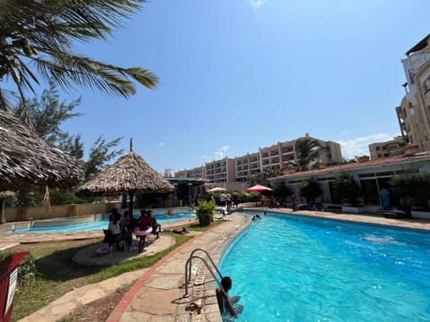 Property building, Pool view, Swimming pool, sunbed
