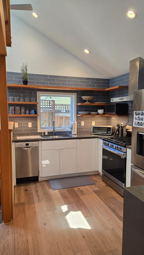 Kitchen or kitchenette, dishwasher, microwave, oven, stove, toaster, kitchen