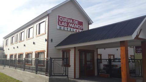 Property building, Facade/entrance, Property logo or sign, Lobby or reception, Text overlay