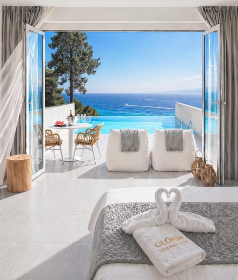 Patio, Patio, Bed, Balcony/Terrace, Balcony/Terrace, Decorative detail, Decorative detail, Bedroom, Text overlay, Text overlay, Sea view, Sea view, Location