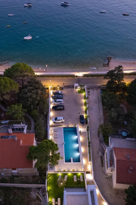 Property building, Bird's eye view, Beach, Swimming pool