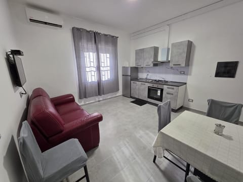 Bed, Kitchen or kitchenette, Seating area, Lunch, stove, kitchen, air conditioner