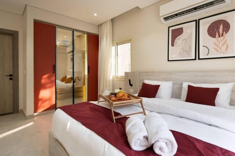 Bed, Photo of the whole room, Seating area, towels, wardrobe, air conditioner