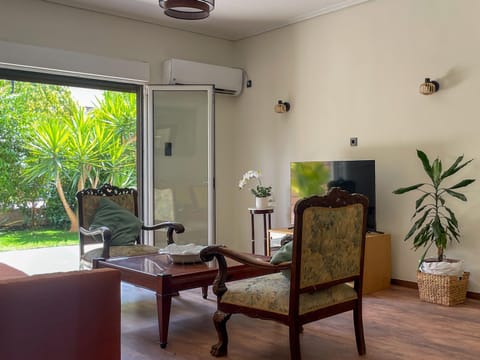 Garden, Living room, Seating area, Garden view, air conditioner