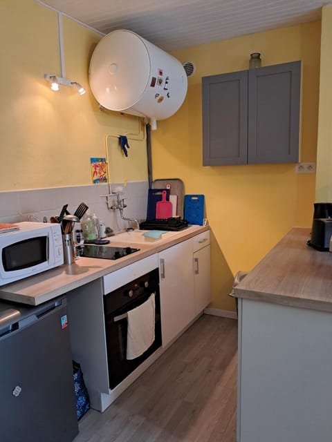Kitchen or kitchenette, oven, stove, toaster