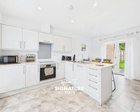 Kitchen or kitchenette, oven, stove, toaster