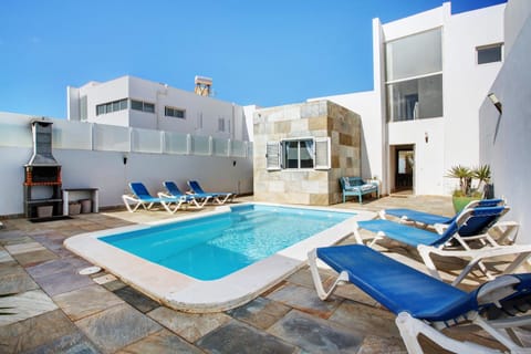 Property building, Living room, Swimming pool