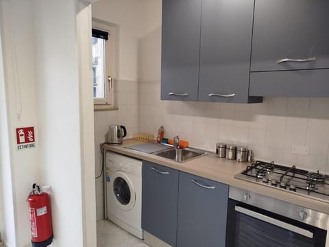 Kitchen or kitchenette, dishwasher, dryer