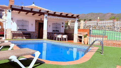 Property building, Patio, Day, Natural landscape, Pool view, Swimming pool, sunbed