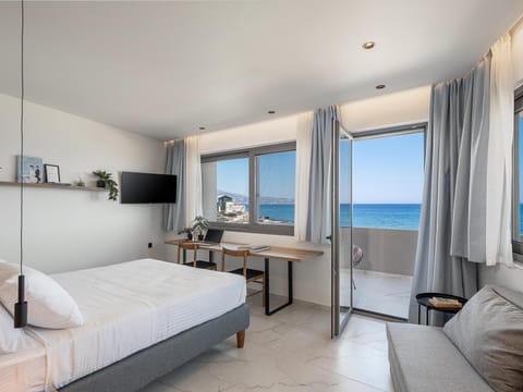 Bed, Living room, Seating area, Sea view
