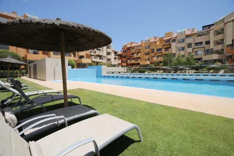 Swimming pool, sunbed