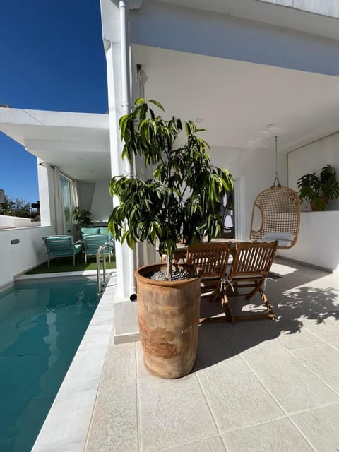 Patio, Day, Balcony/Terrace, Seating area, Pool view, Swimming pool
