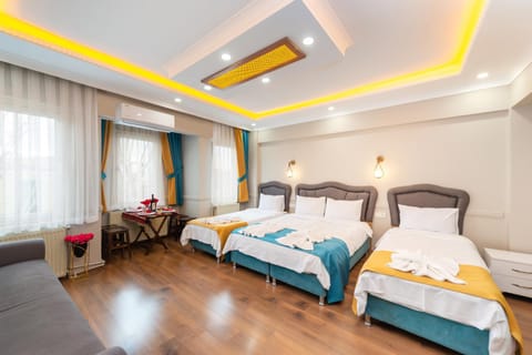 Bed, Living room, Photo of the whole room, Seating area, Bedroom, towels, air conditioner